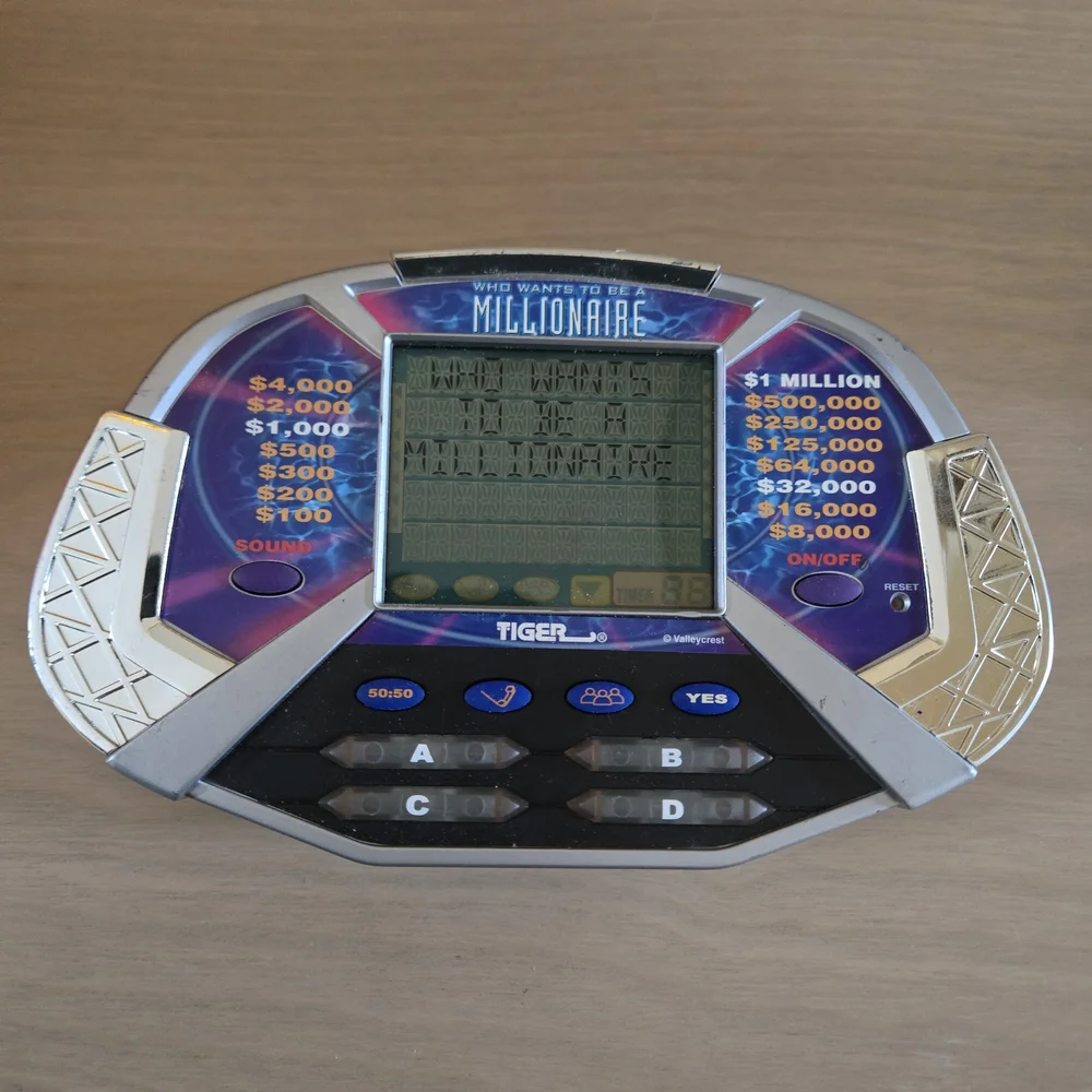Vtg Who Wants To Be A Millionaire Handheld Electronic LCD Tiger Game Tested Work